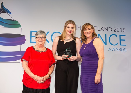 Rhona collecting her award at the CIH Scotland Annual Awards 2018